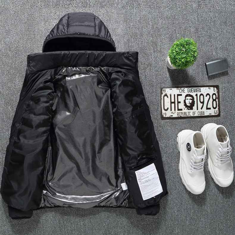Black hooded zip-up puffer heated jacket opened up, showing inner protective lining.