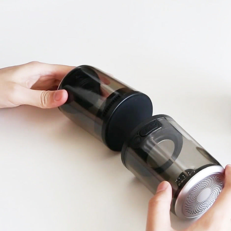 Handheld Bluetooth speaker with transparent outer shell and black end caps