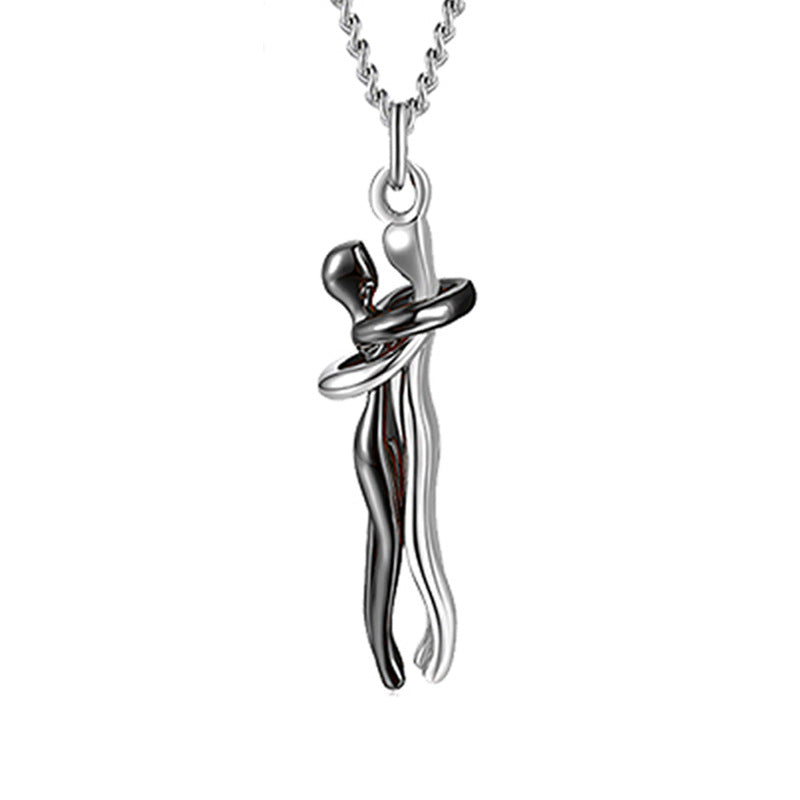 Love hug pendant necklace with silver-toned hugging hands on a chain