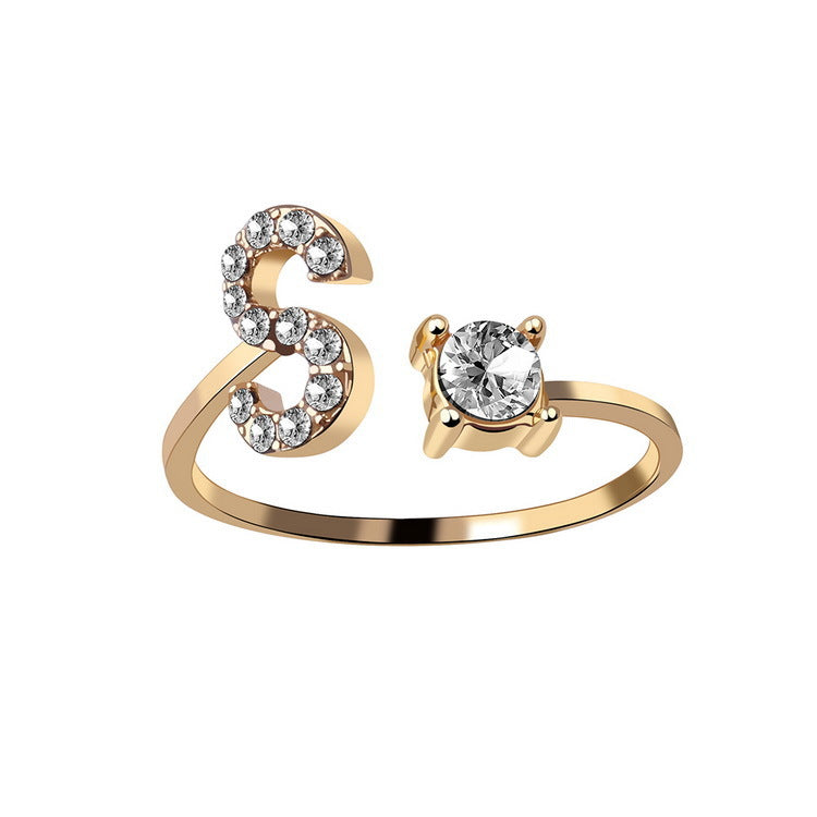 Adjustable initial letter ring with round crystal center and pavé letter detail, rose gold