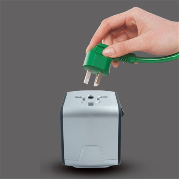 Multi-function socket adapter with green plug inserted into front outlet