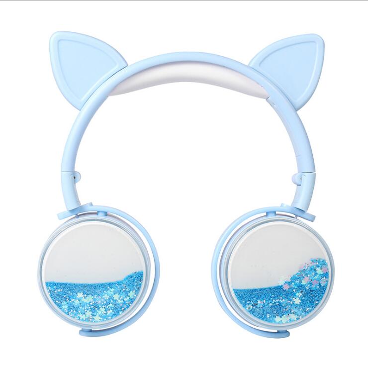 Light blue cat-ear headphones with glitter speaker windows in round ear cups