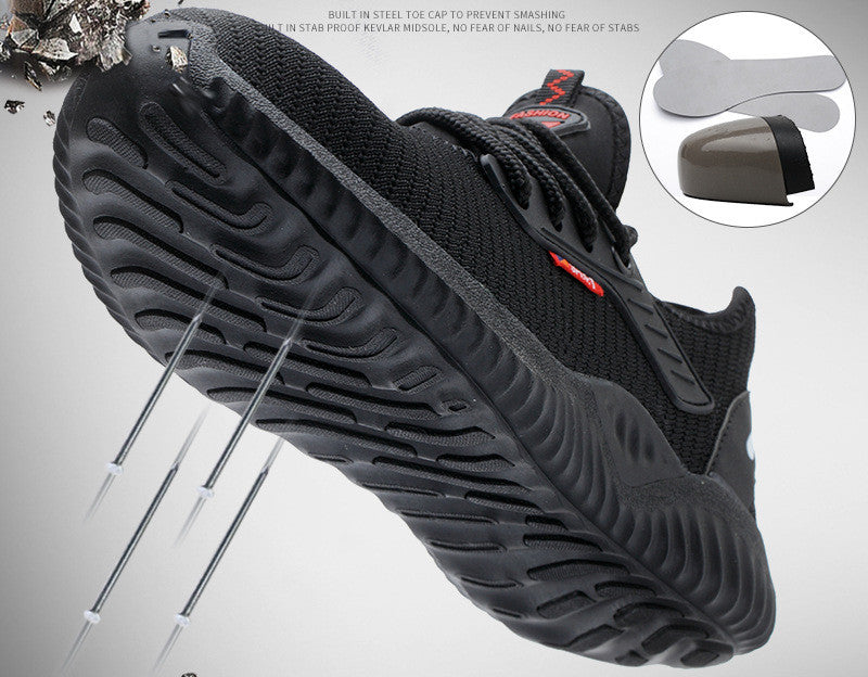 Black safety shoe with lace-up upper and detailed sole pattern for grip
