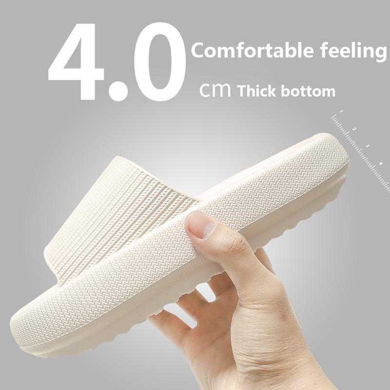 Cream slide slipper with wide textured strap and thick cushioned sole