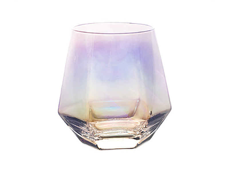 Lavender-tinted glass water cup with a faceted octagon base