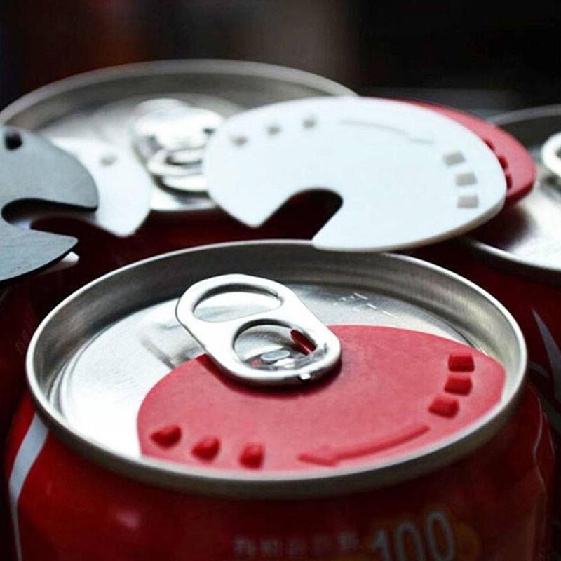Can sealer tool with red magnet lid on soda can top