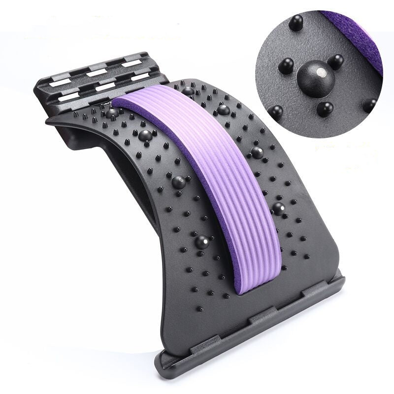 Lumbar traction waist brace with purple support strap and black dotted cushion pads