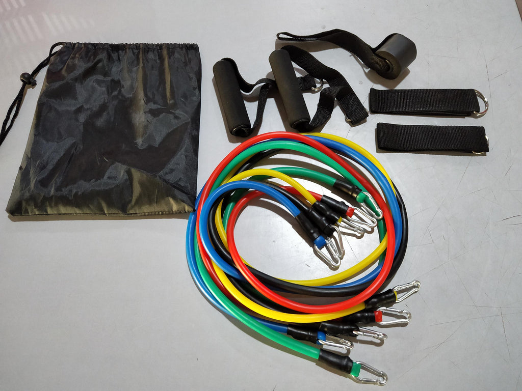 Multicolor resistance rope bands with metal clips and black straps in a storage bag