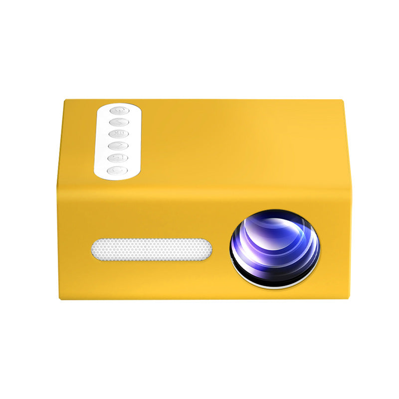 Yellow mini projector front with lens, remote buttons, and speaker grille