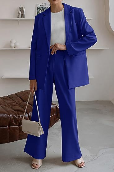 Women’s blue coat and trousers suit, long blazer-style jacket with wide-leg pants