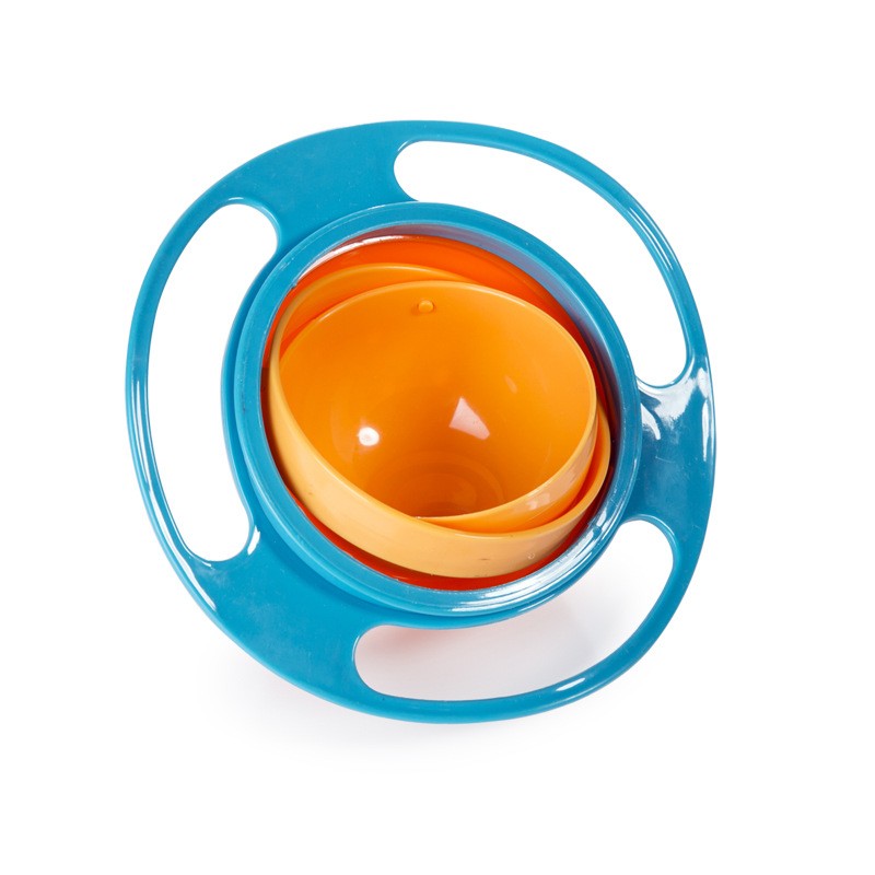 Rotating spill-proof bowl with teal outer ring and orange inner bowl