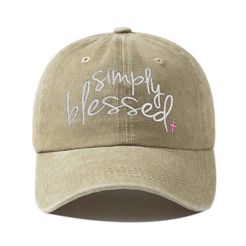 Khaki washed baseball cap with embroidered "Simply Blessed" script