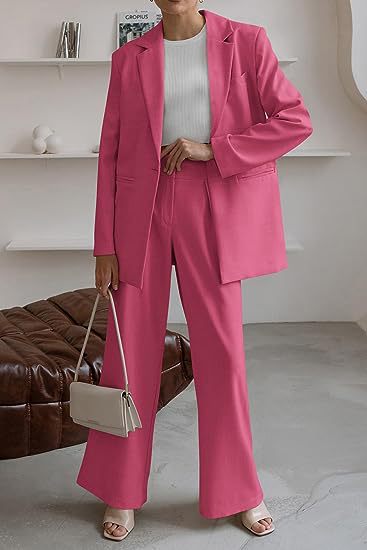 Women’s pink coat and trousers suit, tailored blazer with wide-leg trouser legs