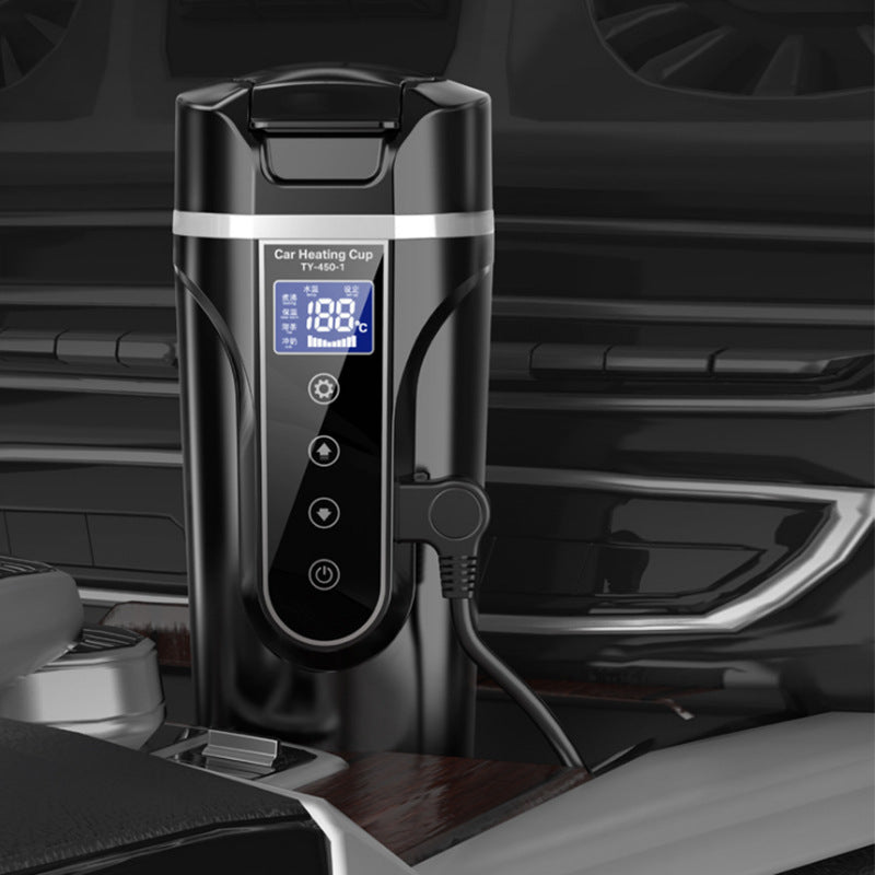 Black heated car cup plugged in with blue display and control buttons