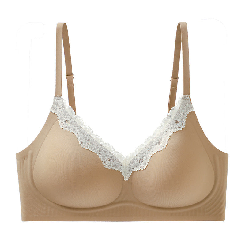 V-neck lace seamless bra, light tan flat lay with white lace V-neck trim and straps