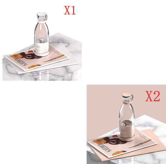 Portable electric juicer blender bottle kit shown on a marble tray in two views