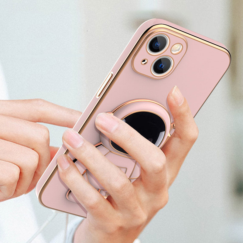 Pink astronaut phone case with 3D character, circular ring holder, and camera cutouts
