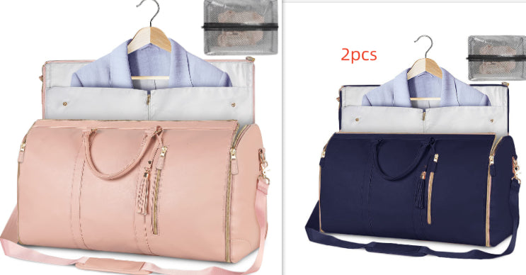 Pink travel duffle bag with tassel zipper pulls and hanging shirt organizer inside