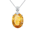 Silver necklace pendant with oval yellow gemstone and rectangular crystal bail