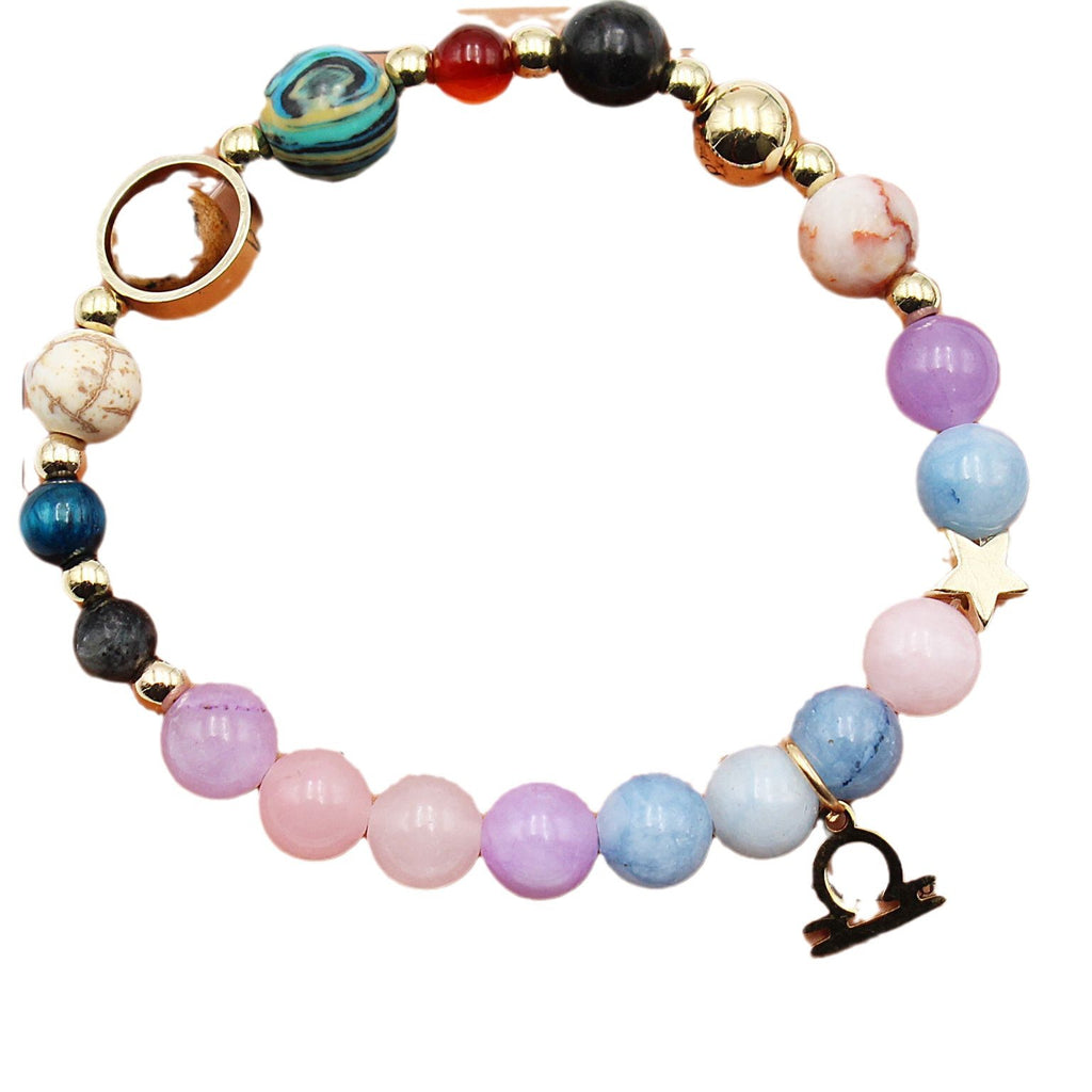 Zodiac beaded bracelet with pastel, blue, pink, and purple beads plus charms