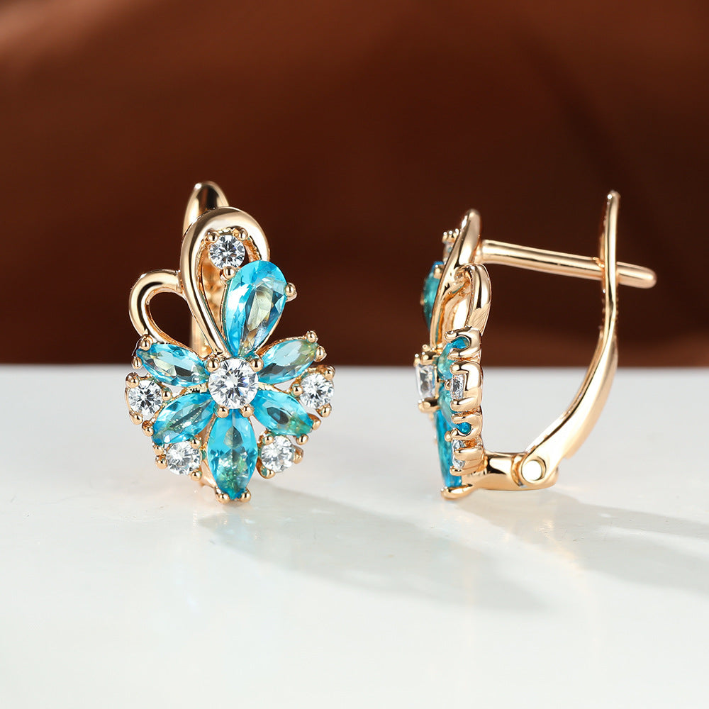Gold flower drop zircon earrings with turquoise stones