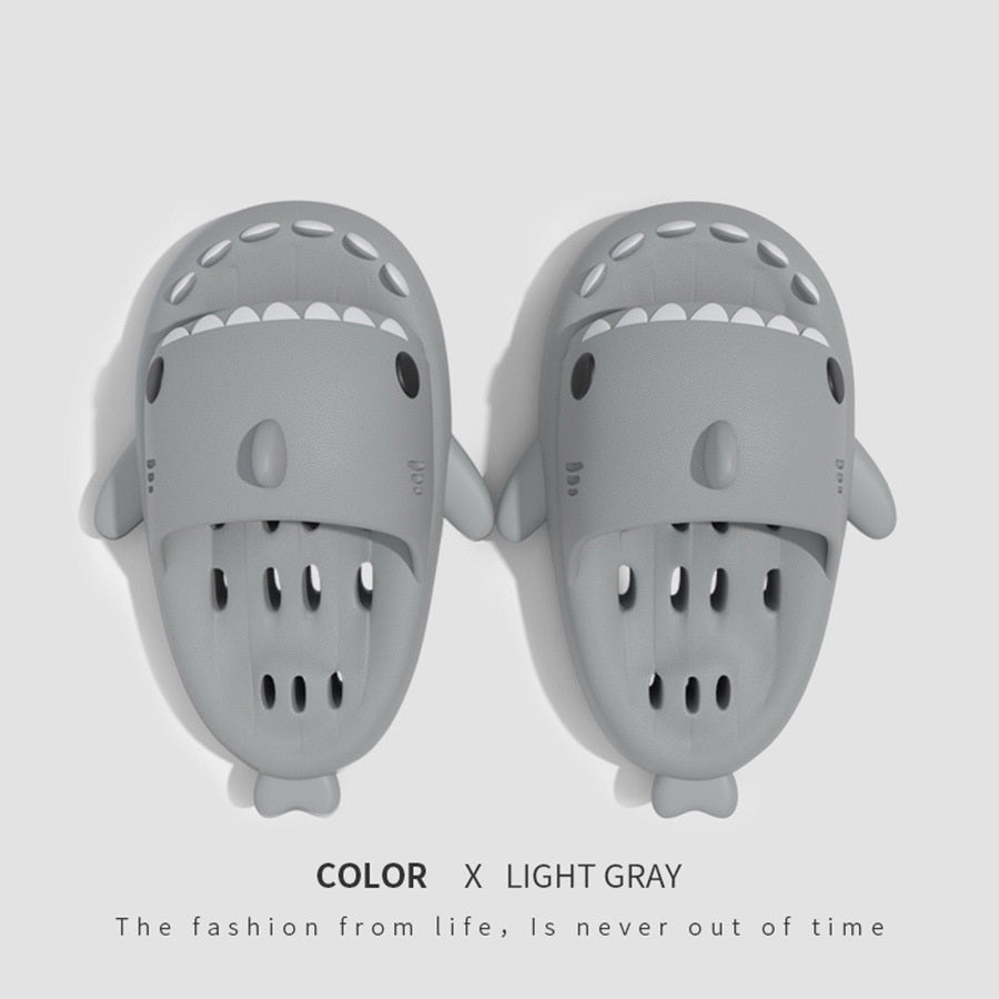 Shark EVA shower slides with drain holes, light gray cartoon design