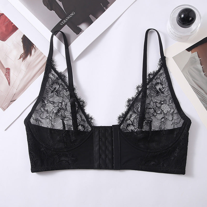 Black lace bra with wide band and scalloped trim, adjustable spaghetti straps