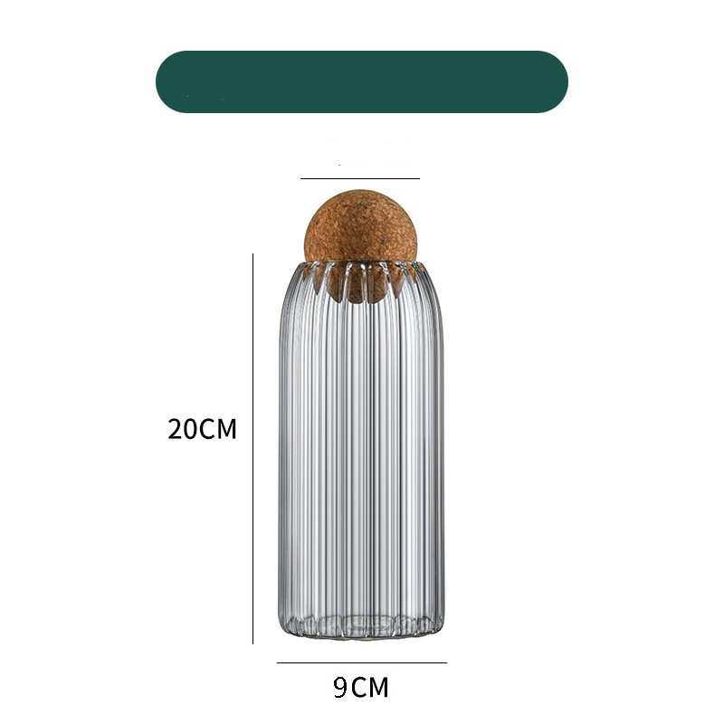 Ribbed glass display bottle with cork lid, 20cm tall and 9cm wide