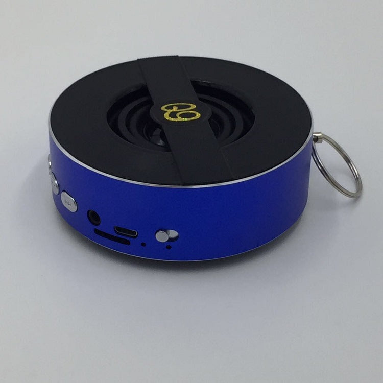 Outdoor Bluetooth speaker, blue with side ports and carrying strap