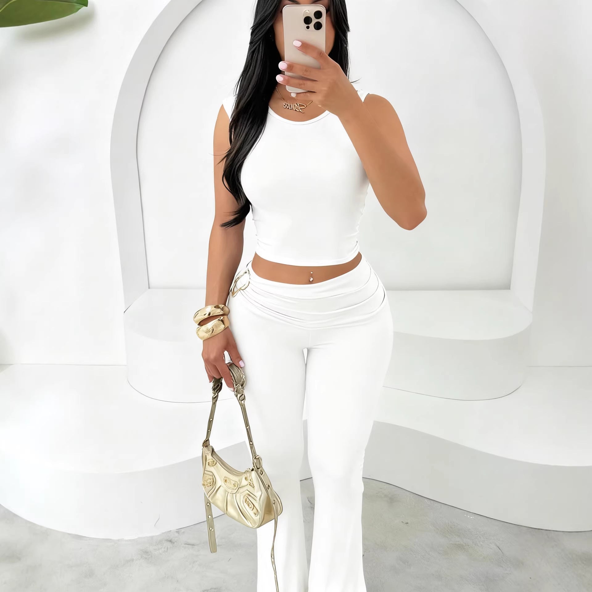 Womens sleeveless crop top and bodycon flare pants set, white