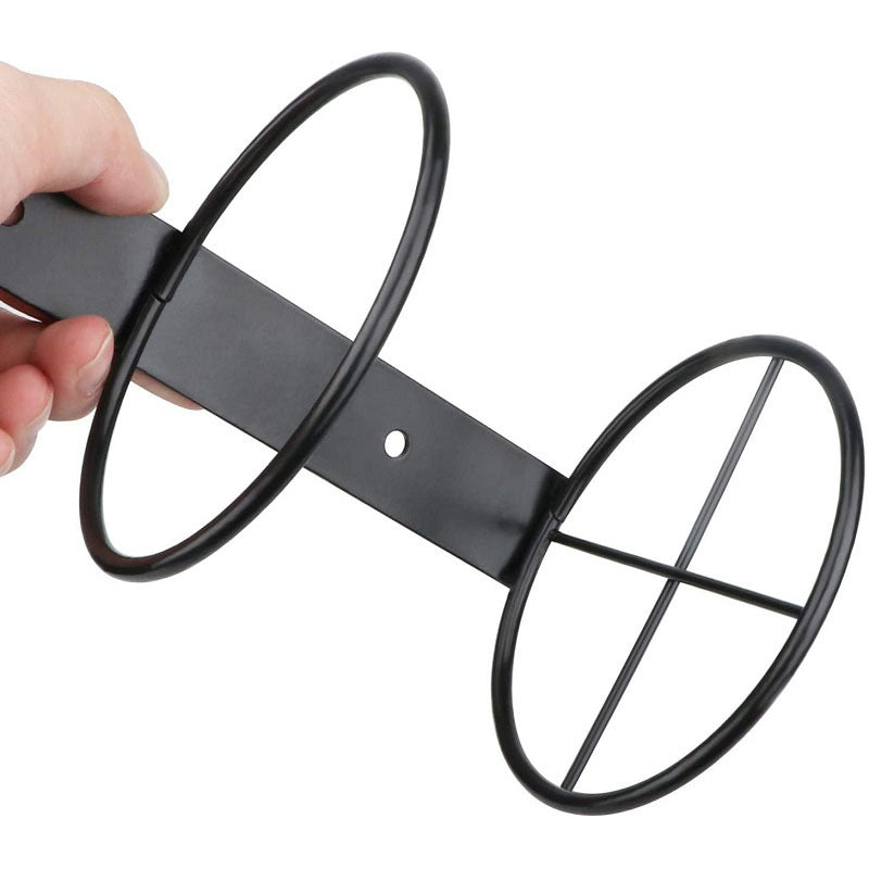 Black wall-mounted wine rack with two oval ring holders on a mounting plate