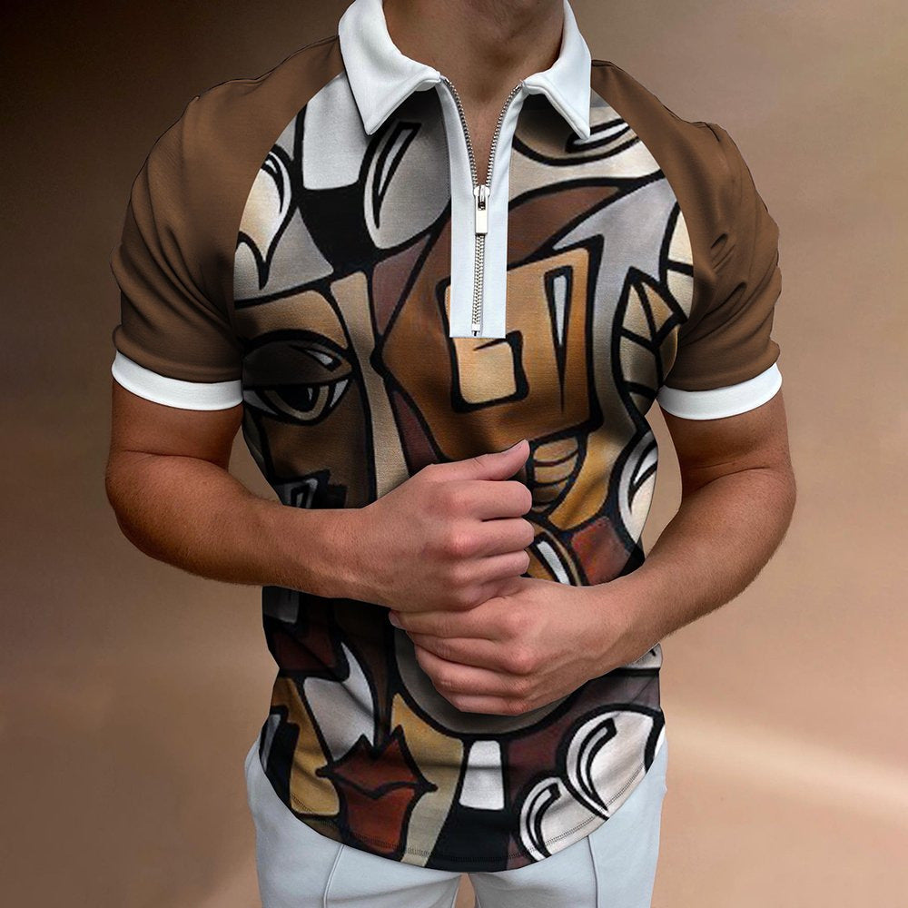 Men’s polo shirt with bold graffiti-style print in black, tan, and white; zip neck, short sleeves.