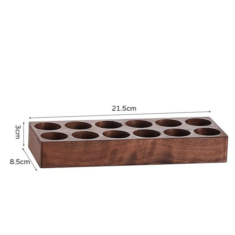 Wooden bean bottle rack with circular openings and 8.5 cm height marking