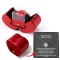 Red jewelry box with clear cover and red rose display; small gift card included