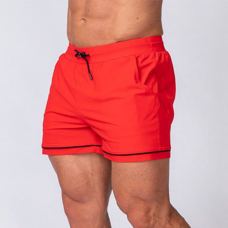 Quick-drying sport running shorts in red, elastic waistband with black drawstring