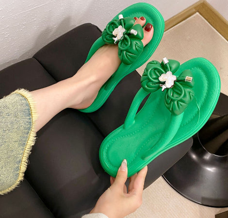 Women’s outdoor slippers, green slide with butterfly bow and white flower accents