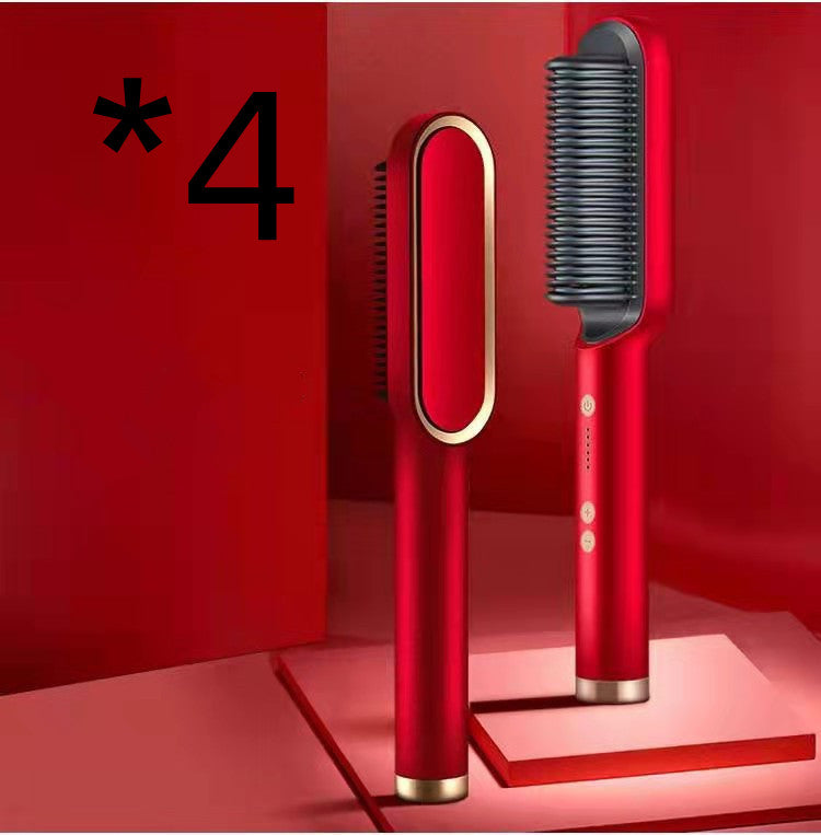 Red electric hot comb hair straightener standing on a small platform