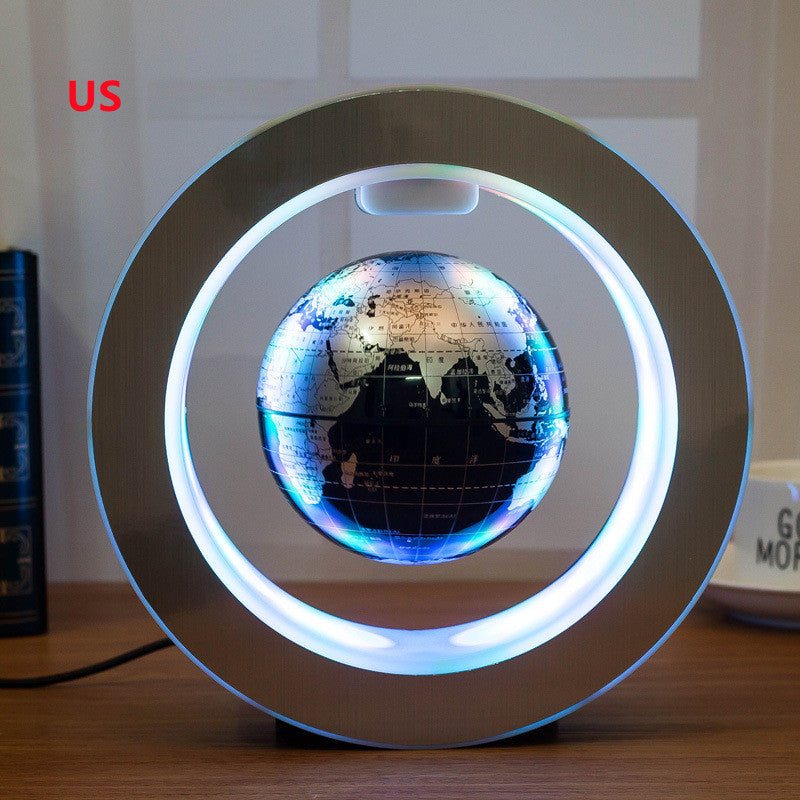 LED floating world map globe with blue oceans and lit continents, circular light ring base