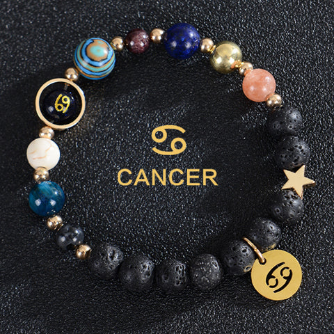 Cancer zodiac beaded bracelet with black lava stones and gold Cancer charm and star