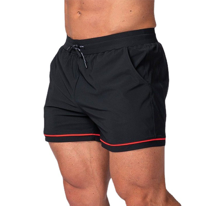 Quick-drying sport running shorts in black, elastic waistband with drawstring and red trim