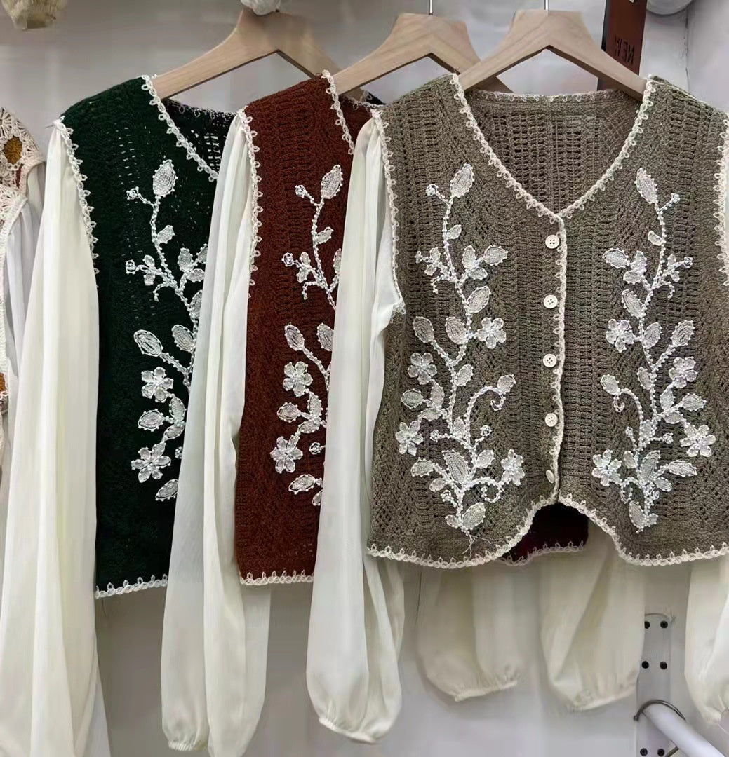 Embroidered V-neck sleeveless tops, dark green, maroon and taupe, hanging display