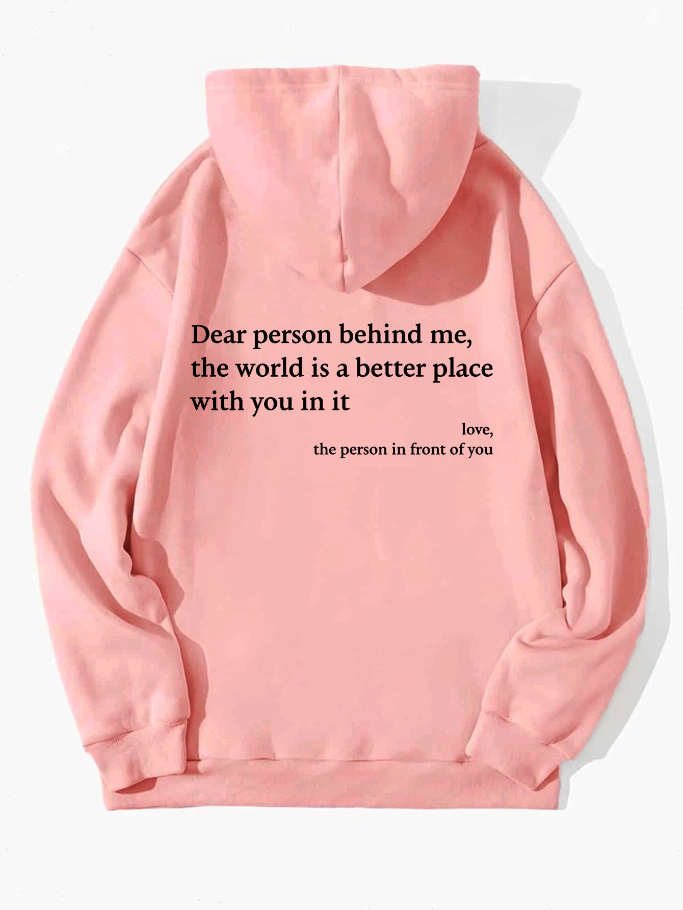 Pink plush hoodie with hood, drawstrings, kangaroo pocket, and printed back message
