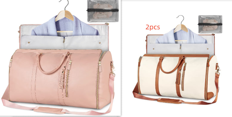 Pink and white travel duffle bags with brown zipper tassel pulls and hanging shirts
