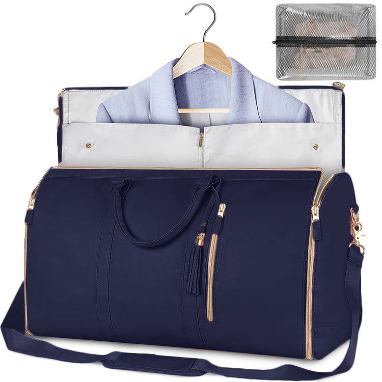 Navy travel duffle bag with light trim, open garment organizer, hanging shirt, shoulder strap