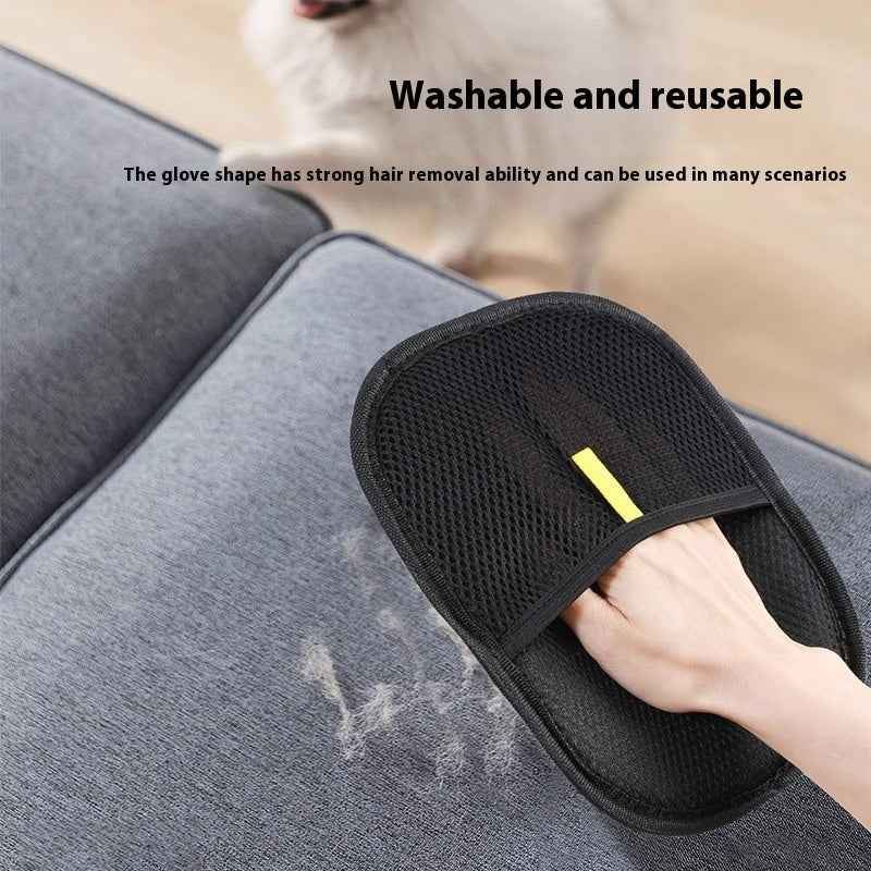Black pet hair removal mitt with textured surface and yellow tab, removing pet hair from fabric