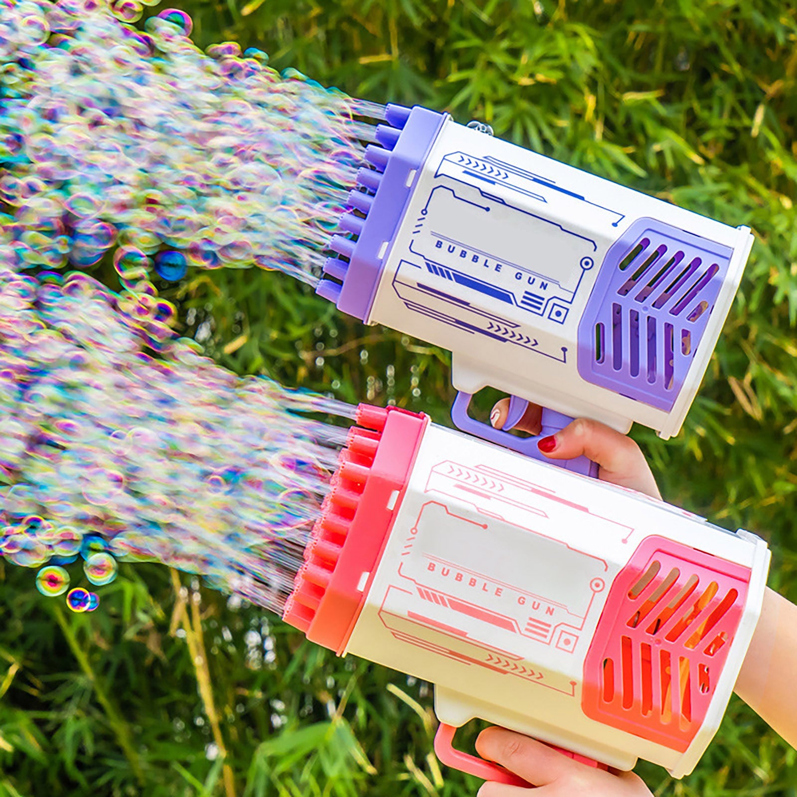 Purple and pink bubble gun toy with side nozzles, producing a rainbow soap bubble spray
