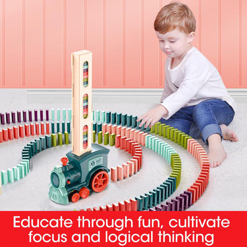 Automatic domino track train toy with teal engine and rainbow domino rails
