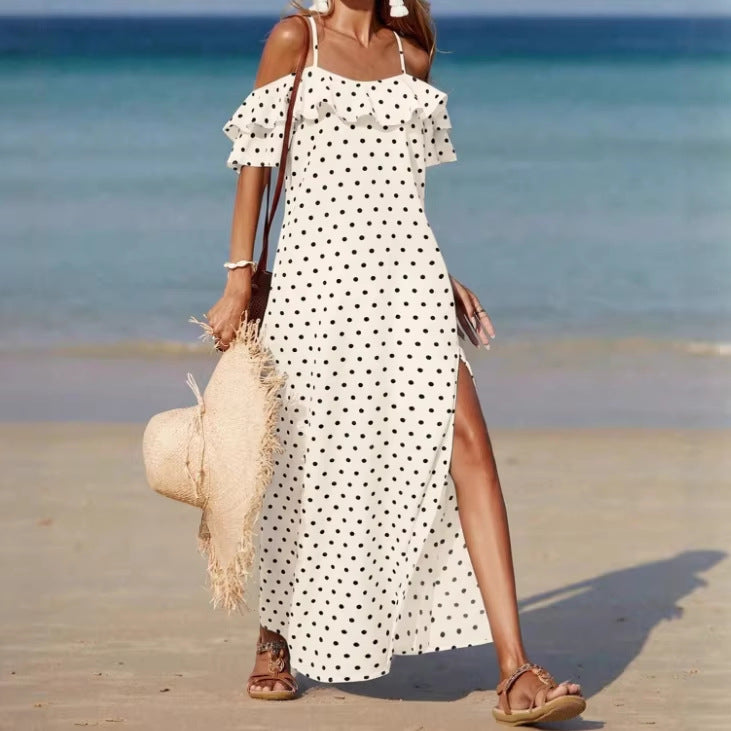 Off-shoulder long polka dot dress in light fabric with ruffled sleeves and side slit