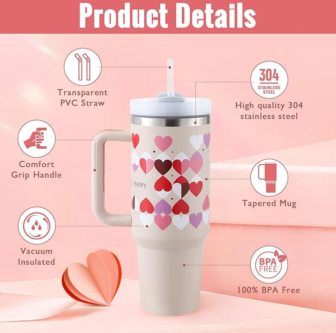 White insulated tapered mug with handle, clear straw, and heart print