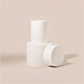 White cylindrical container with matching rounded lid piece